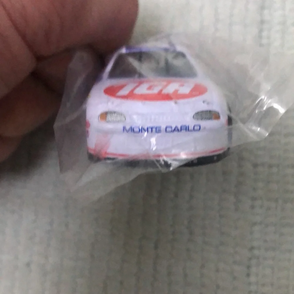 NASCAR die cast toy Monte Carlo Jason Keller #54 car featuring IGA logo. Vintage